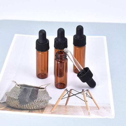 15Pcs Amber Dropper Bottles 4ml Mini Empty Perfume Glass Sample Vials Essential Oil Dropping Bottles Cosmetic Lotion Containers with Glass Dropper...