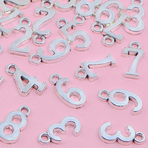 100pcs Antique Silver Arabic Numerals 0-9 Charms Digital Figures Number Pendant Charms Craft Supplies for DIY Necklace Bracelet Jewelry Making Acc...