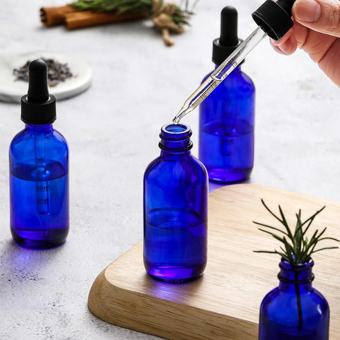 4 Pack 2 oz Glass Dropper Bottles with Measured Dropper - 60ml Dark Blue Tincture Bottles with Graduated Calibrated Glass Eye Droppers (1ml) for E...