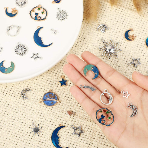 WILLBOND 108 Pieces Jewelry Charms, Mixed Antique Silver Sun Stars Moon Charms Pendants, Assorted Gold Plated Enamel Cat Moon Star Celestial Charm...